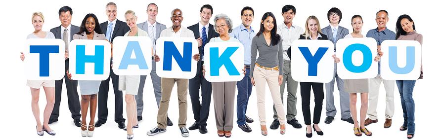 Group Of Multi-Ethnic Group Of Business People Holding Placards Forming Thank You Group Of Multi-Ethnic Group Of Business People Holding Placards Forming Thank You